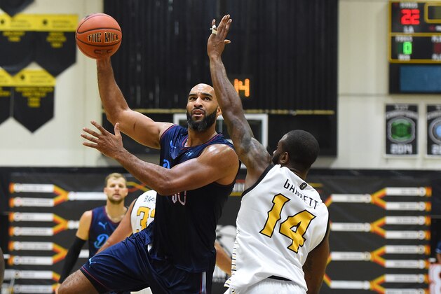 LOS ANGELES, CA - JULY 14:  Justin Edwards #14 of the Broad St. Brawlers defends a shot by Liam McMorrow #50 of Eberlein Drive in The Basketball Tournament Western Regional game at Eagle's Nest Arena on July 14, 2018 in Los Angeles, California.  (Photo by Jayne Kamin-Oncea/Getty Images)