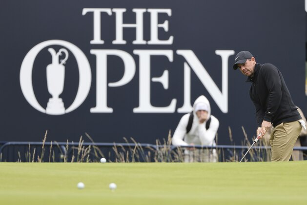 Northern Ireland's Rory McIlroy chips onto the 18th green during a practice round for the British Open Golf Championship at Royal St George's golf course Sandwich, England, Wednesday, July 14, 2021. The Open starts Thursday, July, 15. (AP Photo/Ian Walton)