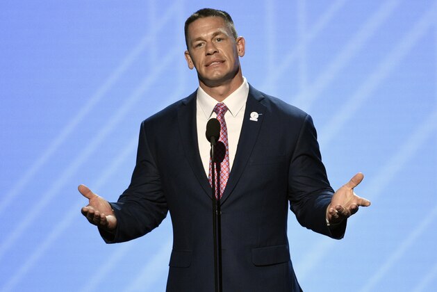 FILE - In this July 12, 2017, file photo, John Cena presents the Jimmy V perseverance award at the ESPYS in Los Angeles. WWE is set to hold its Crown Jewel event Friday, Nov. 2, 2018, in Riyadh, Saudi Arabia. Cena, the 15-year face of the company who could not be reached for comment, was widely reported to have misgivings about his participation in the event and how it might affect his blossoming movie career. (Photo by Chris Pizzello/Invision/AP, File)