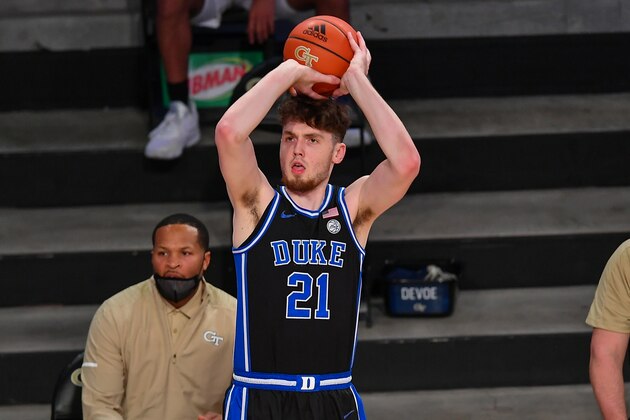 ATLANTA, GA  MARCH 02:  Duke forward Matthew Hurt (21) shoots a three point shot during the NCAA basketball game between the Duke Blue Devils and the Georgia Tech Yellow Jackets on March 2nd, 2021 at Hank McCamish Pavilion in Atlanta, GA.  (Photo by Rich von Biberstein/Icon Sportswire via Getty Images)