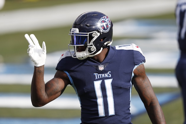 Tennessee Titans wide receiver A.J. Brown (11) warms up before an NFL wild-card playoff football game against the Baltimore Ravens Sunday, Jan. 10, 2021, in Nashville, Tenn. (AP Photo/Wade Payne)