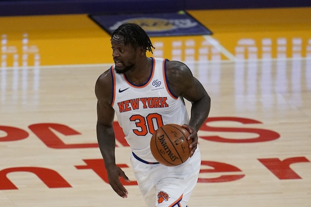 New York Knicks forward Julius Randle (30) controls the ball during an NBA basketball game against the Los Angeles Lakers Tuesday, May 11, 2021, in Los Angeles. (AP Photo/Ashley Landis)