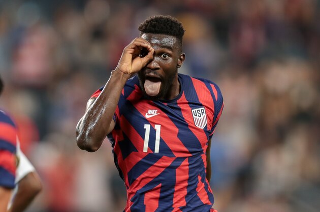 KANSAS CITY, KS - JULY 15: Daryl Dike #11 of the United States scores a goal and celebrates during a game between Martinique and USMNT at Children's Mercy Park on July 15, 2021 in Kansas City, Kansas. (Photo by John Dorton/ISI Photos/Getty Images)