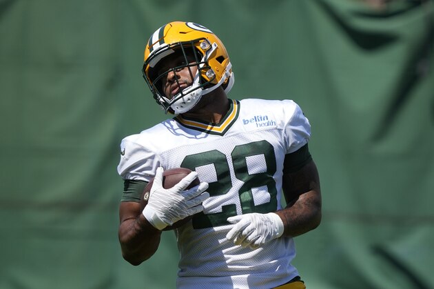 Green Bay Packers' AJ Dillon runs a drill during an NFL football minicamp Tuesday, June 8, 2021, in Green Bay, Wis. (AP Photo/Morry Gash)