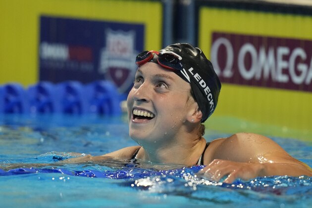 Katie Ledecky reacts after the women's 800 freestyle during wave 2 of the U.S. Olympic Swim Trials on Saturday, June 19, 2021, in Omaha, Neb. (AP Photo/Charlie Neibergall)