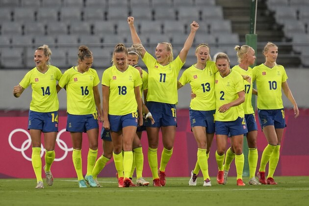 FILE - In this July 21, 2021, file photo, Sweden's Stina Blackstenius (11) celebrates scoring her side's second goal against the United States during a women's soccer match at the 2020 Summer Olympics, in Tokyo. The Tokyo Games have 18 new events this year and will be the first with nearly equal gender participation. (AP Photo/Ricardo Mazalan, File)