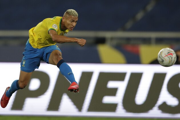 Brazil's Richarlison kicks a ball during a Copa America quarterfinal soccer match against Chile at the Nilton Santos stadium in Rio de Janeiro, Brazil, Friday, July 2, 2021. (AP Photo/Silvia Izquierdo)