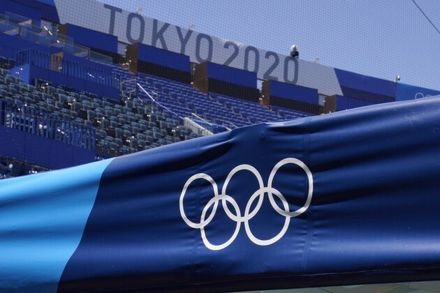 The Olympic Rings and a Tokyo 2020 sign are pictured inside Yokohama Baseball Stadium at the 2020 Summer Olympics, Wednesday, July 21, 2021, in Yokohama, Japan. (AP Photo/Sue Ogrocki)