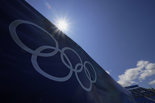 The Olympic Rings are pictured at Yokohama Baseball Stadium as the stadium is readied for competition at the 2020 Summer Olympics, Thursday, July 22, 2021, in Yokohama. (AP Photo/Sue Ogrocki)