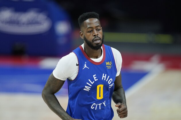 Denver Nuggets forward JaMychal Green plays during the first half of an NBA basketball game, Friday, May 14, 2021, in Detroit. (AP Photo/Carlos Osorio)