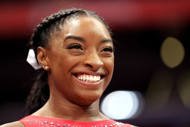 Simone Biles smiles during the U.S. Olympic Trials where she finished first before heading to Tokyo to defend her gold medals.
