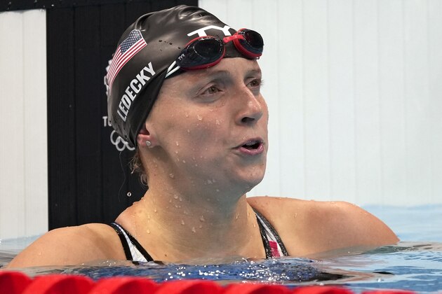 Katie Ledecky of United States looks up after her swim in a women's 200-meter freestyle semifinal at the 2020 Summer Olympics, Tuesday, July 27, 2021, in Tokyo, Japan. (AP Photo/Matthias Schrader)