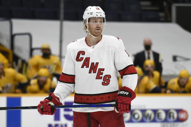 Carolina Hurricanes defenseman Dougie Hamilton (19) plays against the Nashville Predators during the first period of an NHL hockey game Saturday, May 8, 2021, in Nashville, Tenn. (AP Photo/Mark Zaleski)