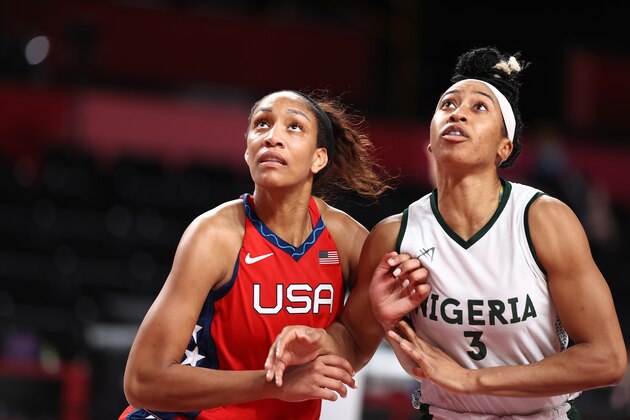 TOKYO, JAPAN - JULY 27:  A'ja Wilson #9 of the USA Basketball Womens National Team and Pallas Kunaiyi-Akpanah #3 of the Nigeria Womens National Team look up for the rebound during the 2020 Tokyo Olympics at the Saitama Super Arena on July 27, 2021 in Tokyo, Japan. NOTE TO USER: User expressly acknowledges and agrees that, by downloading and/or using this Photograph, user is consenting to the terms and conditions of the Getty Images License Agreement. Mandatory Copyright Notice: Copyright 2021 NBAE (Photo by Stephen Gosling/NBAE via Getty Images)