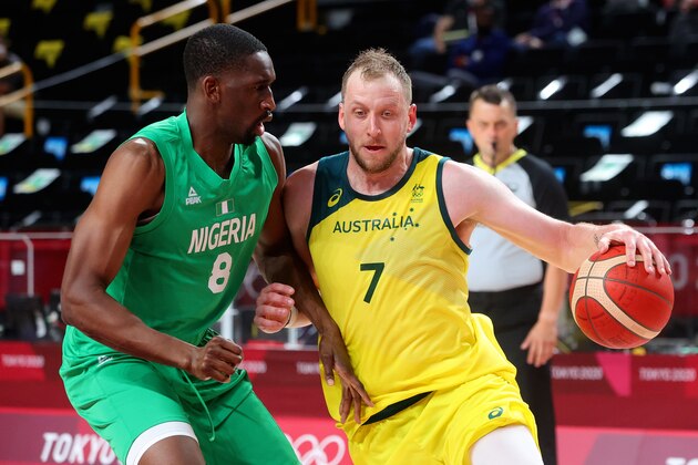 TOKYO, JAPAN - JULY 25: Joe Ingles of Team Australia and Ekpe Udoh of Team Nigeria contest the ball during the Men's Basketball preliminary Round Group B  - Match 3 between Australia and Nigeria on Day 2 of the Tokyo 2020 Olympic Games at Saitama Super Arena on July 25, 2021 in Tokyo, Japan. (Photo by Pete Dovgan/Speed Media/Icon Sportswire via Getty Images)