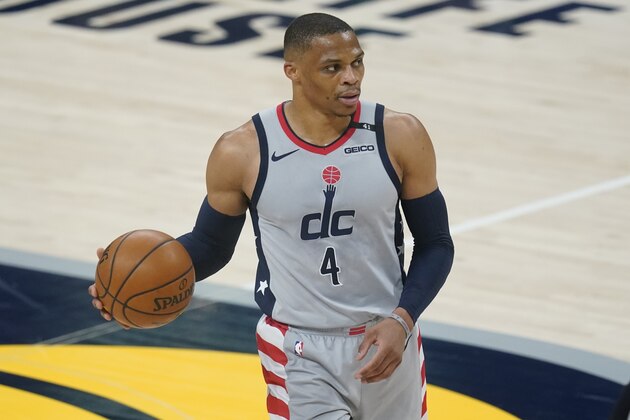 Washington Wizards' Russell Westbrook dribbles during the first half of an NBA basketball game against the Indiana Pacers, Saturday, May 8, 2021, in Indianapolis. (AP Photo/Darron Cummings)
