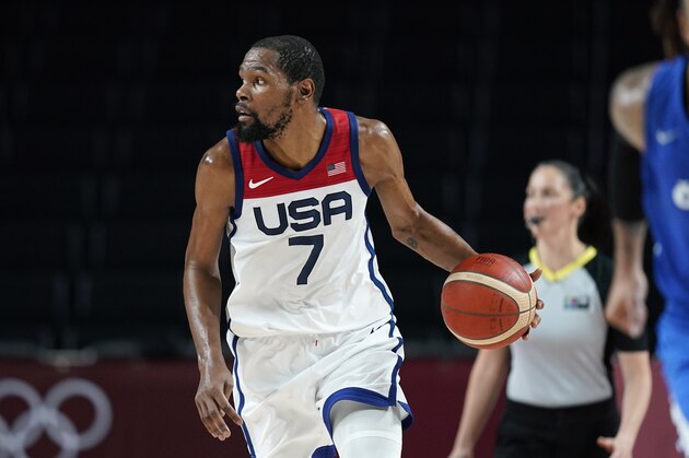United States's Kevin Durant (7) drives up court during a men's basketball preliminary round game against the Czech Republic at the 2020 Summer Olympics, Saturday, July 31, 2021, in Saitama, Japan. (AP Photo/Charlie Neibergall)