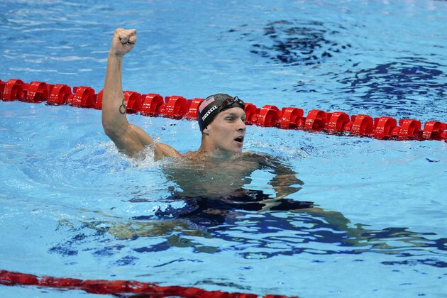 Caeleb Dressel, of the United States, celebrates after winning the gold medal in the men's 50-meter freestyle final at the 2020 Summer Olympics, Sunday, Aug. 1, 2021, in Tokyo, Japan. (AP Photo/Jae C. Hong)