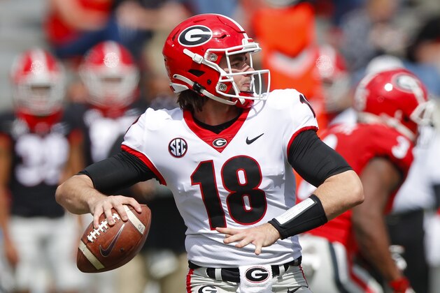 ATHENS, GA - APRIL 17: Quarterback JT Daniels #18 of the Georgia Bulldogs drops back to pass during the second half of the G-Day spring game at Sanford Stadium on April 17, 2021 in Athens, Georgia. (Photo by Todd Kirkland/Getty Images)