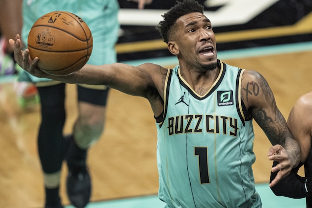 Charlotte Hornets guard Malik Monk (1) drives to the basket against the Los Angeles Clippers during the second half of an NBA basketball game in Charlotte, N.C., Thursday, May 13, 2021. (AP Photo/Jacob Kupferman)