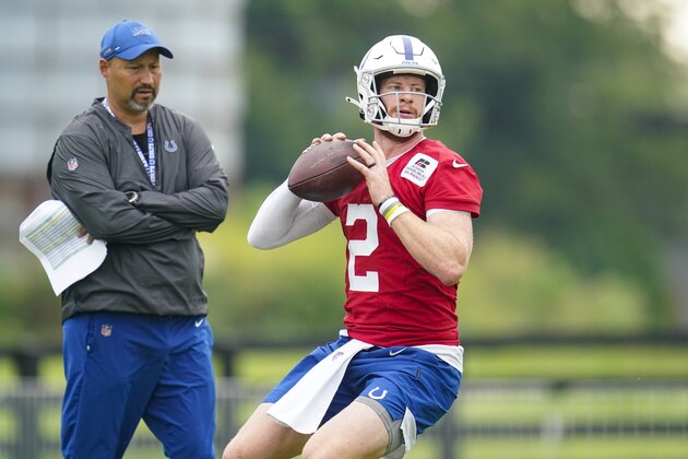 Indianapolis Colts quarterback Carson Wentz runs a drill during practice at the NFL team's football training camp in Westfield, Ind., Thursday, July 29, 2021. (AP Photo/Michael Conroy)