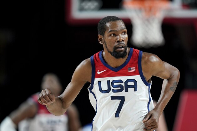 United States's Kevin Durant (7) runs up court after making a 3-point basket during a men's basketball preliminary round game against the Czech Republic at the 2020 Summer Olympics, Saturday, July 31, 2021, in Saitama, Japan. (AP Photo/Charlie Neibergall)