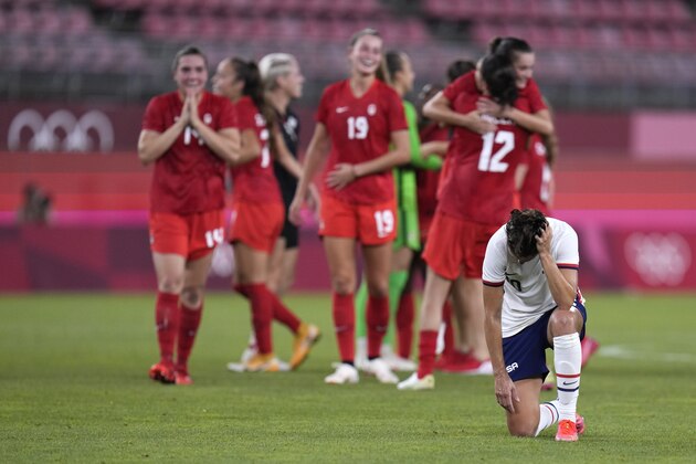 United States' Carli Lloyd reacts after being defeated 1-0 by Canada during a women's semifinal soccer match at the 2020 Summer Olympics, Monday, Aug. 2, 2021, in Kashima, Japan. (AP Photo/Fernando Vergara)
