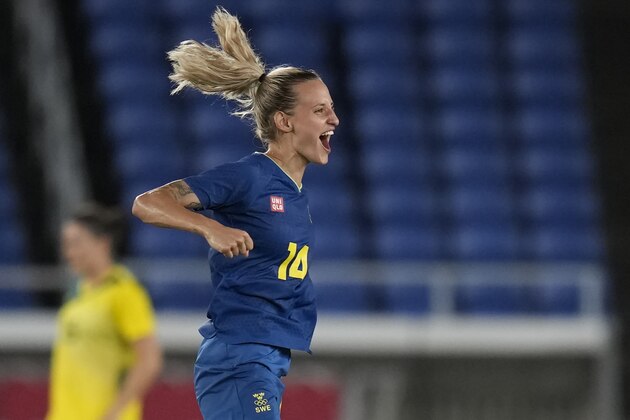 Sweden's Nathalie Bjorn celebrates their team's 1-0 victory over Australia during a women's semifinal soccer match at the 2020 Summer Olympics, Monday, Aug. 2, 2021, in Yokohama, Japan. (AP Photo/Silvia Izquierdo)