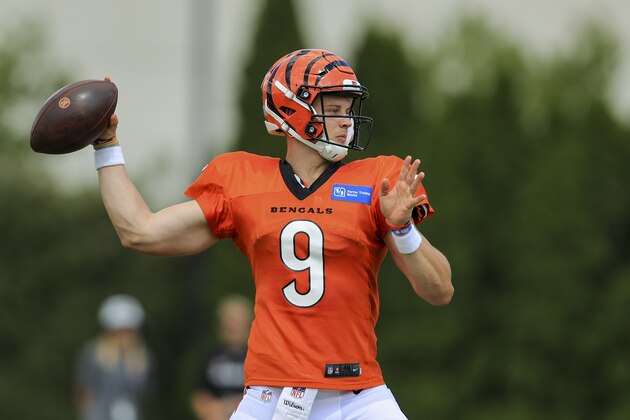 Cincinnati Bengals' Joe Burrow throws a pass in a drill during an NFL football practice in Cincinnati, Tuesday, Aug. 3, 2021. (AP Photo/Aaron Doster)