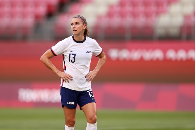 KASHIMA, JAPAN - AUGUST 02: Alex Morgan of Team USA looks on during the Women's Football Semifinal match between USA and Canada at Kashima Stadium on August 02, 2021 in Kashima, Ibaraki, Japan. (Photo by Naomi Baker/Getty Images) KASHIMA, JAPAN - AUGUST 02: Alex Morgan of Team USA looks on during the Women's Football Semifinal match between USA and Canada at Kashima Stadium on August 02, 2021 in Kashima, Ibaraki, Japan. (Photo by Naomi Baker/Getty Images)
