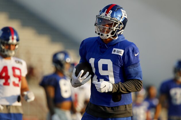 Wide receiver Kenny Golladay runs with the ball during New York Giants NFL training camp held at Eddie Moraes Stadium, Saturday, July 31, 2021, in Newark, N.J. (AP Photo/John Munson)