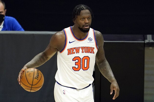 New York Knicks forward Julius Randle dribbles during an NBA basketball game against the Los Angeles Clippers Sunday, May 9, 2021, in Los Angeles. (AP Photo/Marcio Jose Sanchez)