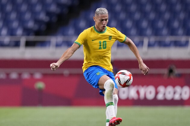 Brazil's Richarlison controls the ball during a men's quarterfinal soccer match against Egypt at the 2020 Summer Olympics, Saturday, July 31, 2021, in Saitama, Japan. (AP Photo/Martin Mejia)