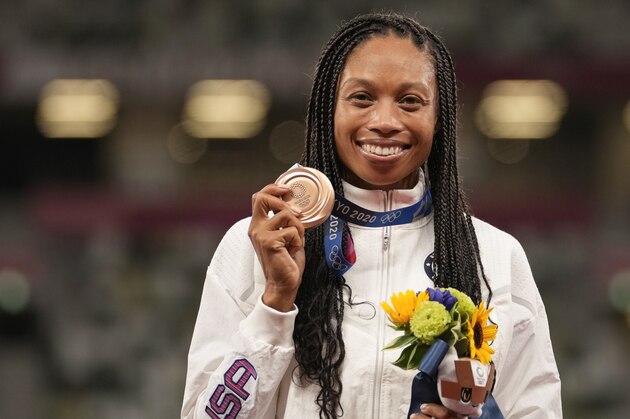 Bronze medalist Allyson Felix, of the United States, poses during the medal ceremony for the women's 400-meter run at the 2020 Summer Olympics, Friday, Aug. 6, 2021, in Tokyo. (AP Photo/Martin Meissner)
