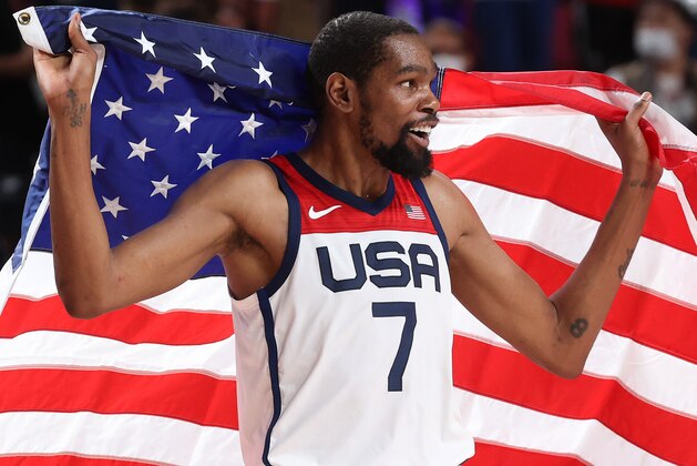 SAITAMA, JAPAN - AUGUST 07: Kevin Durant #7 of Team United States celebrates following the United States' victory over France in the Men's Basketball Finals game on day fifteen of the Tokyo 2020 Olympic Games at Saitama Super Arena on August 07, 2021 in Saitama, Japan. (Photo by Gregory Shamus/Getty Images)