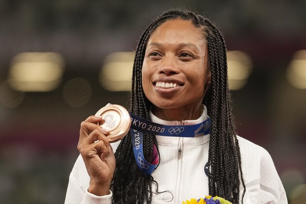Bronze medalist Allyson Felix, of the United States, poses during the medal ceremony for the women's 400-meter run at the 2020 Summer Olympics, Friday, Aug. 6, 2021, in Tokyo. (AP Photo/Martin Meissner)
