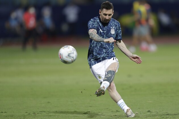 Argentina's Lionel Messi warms up prior to a Copa America quarterfinal soccer match against Ecuador at the Olimpico stadium in Goiania, Brazil, Saturday, July 3, 2021. (AP Photo/Andre Penner)