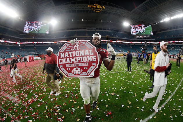 MIAMI, FL - JANUARY 11: Najee Harris #22 of the Alabama Crimson Tide holds a National Champions sign after their win over The Ohio State Buckeyes in the College Football Playoff National Championship at Hard Rock Stadium on January 11, 2021 in Miami, Florida. (Photo by UA Athletics/Collegiate Images/Getty Images)