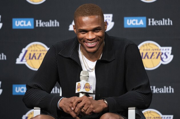 Los Angeles Lakers guard Russell Westbrook smiles during an introductory NBA basketball news conference in Los Angeles, Tuesday, Aug. 10, 2021. (AP Photo/Kyusung Gong)