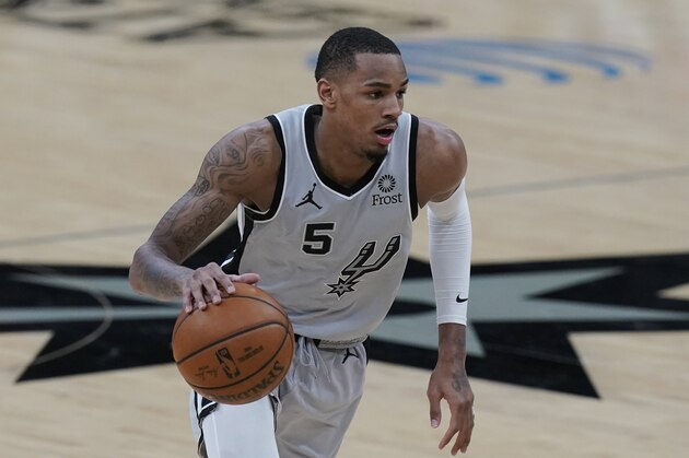 San Antonio Spurs guard Dejounte Murray (5) during the second half of an NBA basketball game against the Milwaukee Bucks in San Antonio, Monday, May 10, 2021. (AP Photo/Eric Gay)
