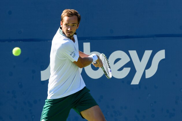 TORONTO, ON - AUGUST 15: Daniil Medvedev (RUS) returns the ball during the National Bank Open tennis tournament Final on August 15, 2021, at Aviva Centre in Toronto, ON, Canada. (Photo by Julian Avram/Icon Sportswire via Getty Images)