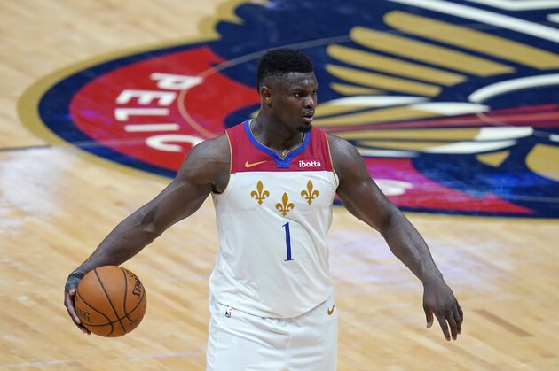 New Orleans Pelicans forward Zion Williamson (1) moves the ball up court in the second half of an NBA basketball game against the Golden State Warriors in New Orleans, Tuesday, May 4, 2021. (AP Photo/Gerald Herbert)