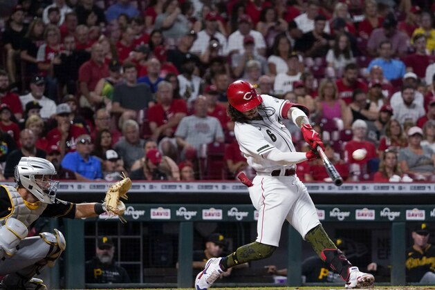 Cincinnati Reds' Jonathan India hits a home run during the sixth inning of the team's baseball game against the Pittsburgh Pirates in Cincinnati on Friday, Aug. 6, 2021. (AP Photo/Jeff Dean)