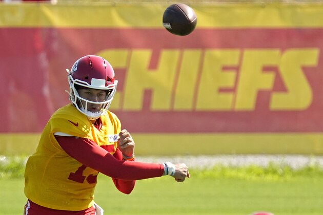 Kansas City Chiefs quarterback Patrick Mahomes passes the ball at NFL football training camp Tuesday, Aug. 17, 2021, in St. Joseph, Mo. (AP Photo/Charlie Riedel)