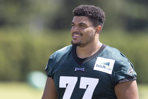 PHILADELPHIA, PA - AUGUST 05: Andre Dillard #77 of the Philadelphia Eagles looks on during training camp at the NovaCare Complex on August 5, 2021 in Philadelphia, Pennsylvania. (Photo by Mitchell Leff/Getty Images)