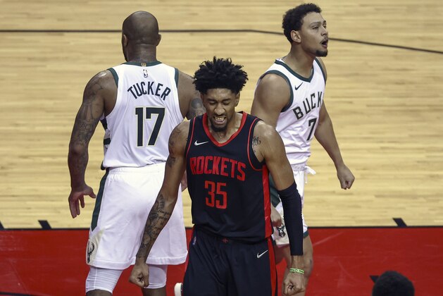 Houston Rockets center Christian Wood (35) reacts after a play during the first quarter of an NBA basketball game against the Milwaukee Bucks Thursday, April 29, 2021, in Houston. (Troy Taormina/Pool Photo via AP)