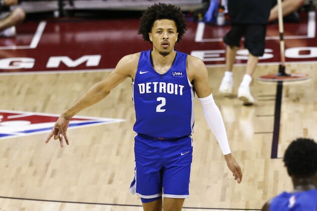 Detroit Pistons' Cade Cunningham celebrates a 3-point shot against the Houston Rockets during the first half of an NBA summer league basketball game Tuesday, Aug. 10, 2021, in Las Vegas. (AP Photo/Chase Stevens)