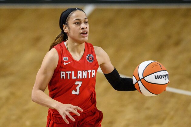 Atlanta Dream guard Chennedy Carter (3) in action during a WNBA basketball game against the Dallas Wings, Thursday, May 27, 2021, in College Park, Ga. (AP Photo/Danny Karnik)