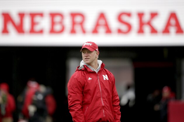Nebraska head coach Scott Frost follows warmups before an NCAA college football game against Iowa in Lincoln, Neb., Friday, Nov. 29, 2019. (AP Photo/Nati Harnik)