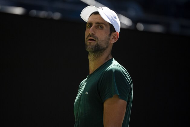 NEW YORK, NEW YORK - AUGUST 24: Novak Djokovic of Serbia practices with Casper Rudd of Norway before the start of the US Open at the USTA Billie Jean King National Tennis Center on August 24, 2021 in New York City. (Photo by TPN/Getty Images)